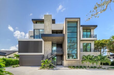 exterior architectural photography of a 3 story modern residence designed by dsdg with geometrical shapes and neutral tones
